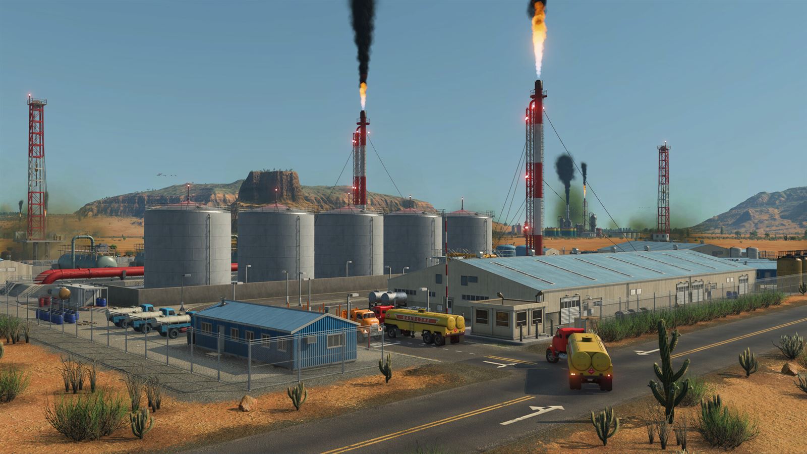 Transport Fever 3 screenshot: an oil refinery with trucks on a desert road